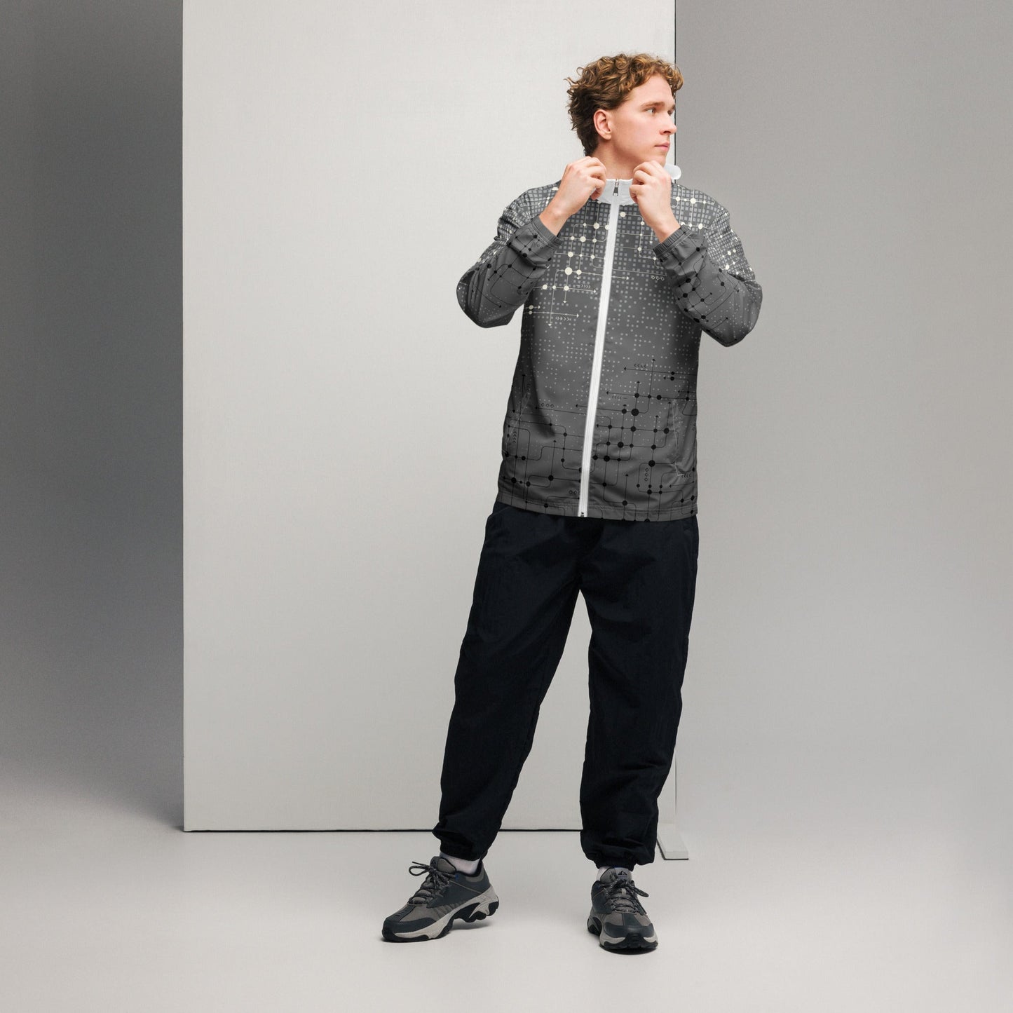 Techline Windbreaker - Left Placement image 2: Black version, size S with front view of the Tech range.