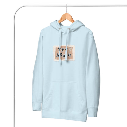 Retry Hoodie - Left Placement image 19: Charcoal Heather version, size S with front view of the Try Again range.
