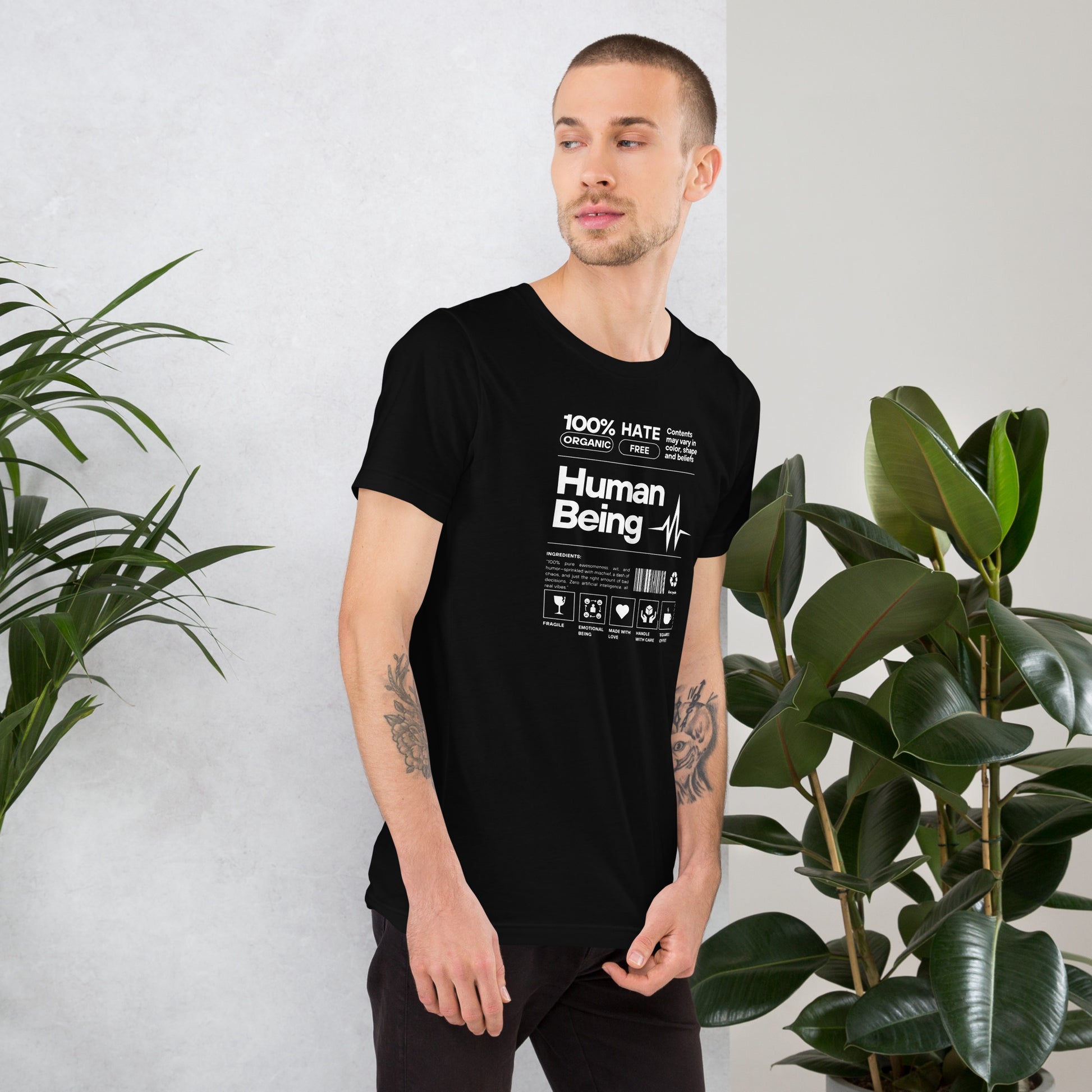 Human Form T-Shirt - Left Placement image 2: Black Heather version, size S with right-side angle of the Human Being range.