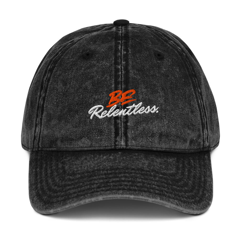 Relentless Cap - Left Placement image 1: Black version with front view of the Be Relentless range.
