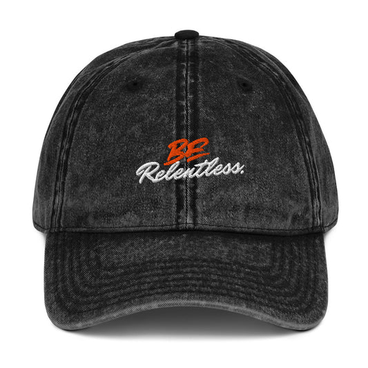 Relentless Cap - Left Placement image 1: Black version with front view of the Be Relentless range.